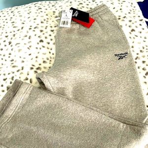 Brand new Reebok gray sweatpants with original tags. Size large